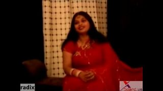 chubby fat indian bhabhi in red sari having some fun